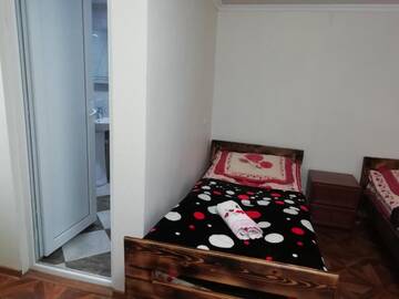 Фото номера Трехместный номер с собственной ванной комнатой Гостевой дом Guest House Carpediem г. Becho 2
